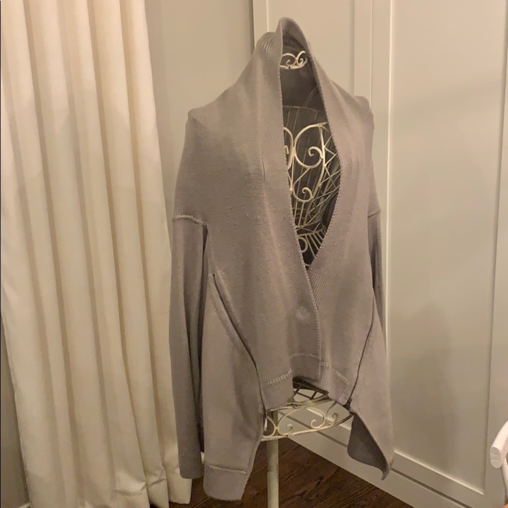 Women’s asymmetrical snap front sweater